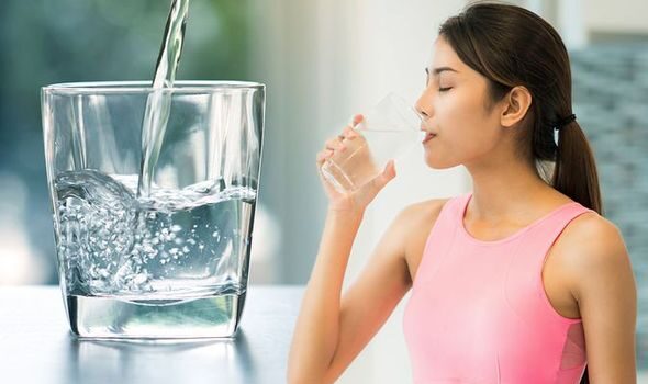 weight-loss-diet-woman-drinking-water-slimming-1164774-2673391