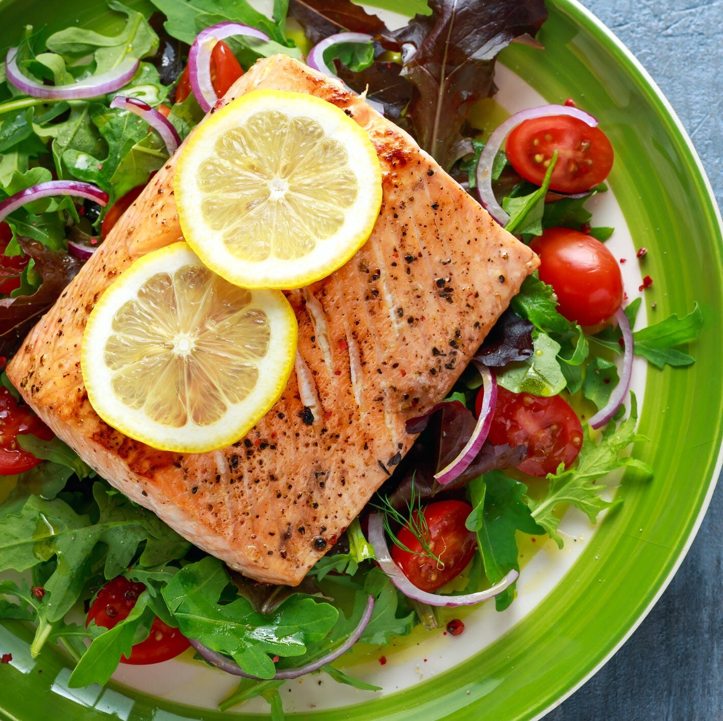 baked-salmon-steak-with-tomato-onion-mix-of-green-royalty-free-image-854595130-1543262389-5168482