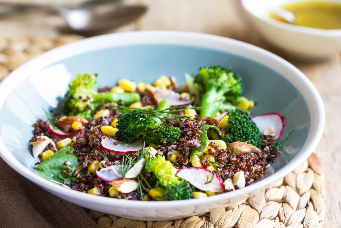 broccoli-salad-in-bowl-with-quinoa-and-radish-and-sweetcorn-9096017