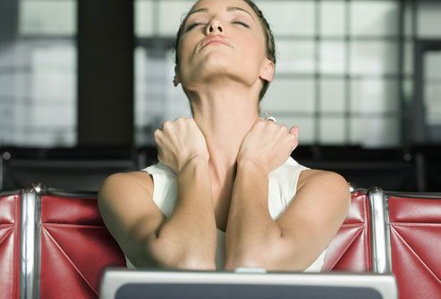 getty_rf_photo_of_woman_touching_neck-6170842
