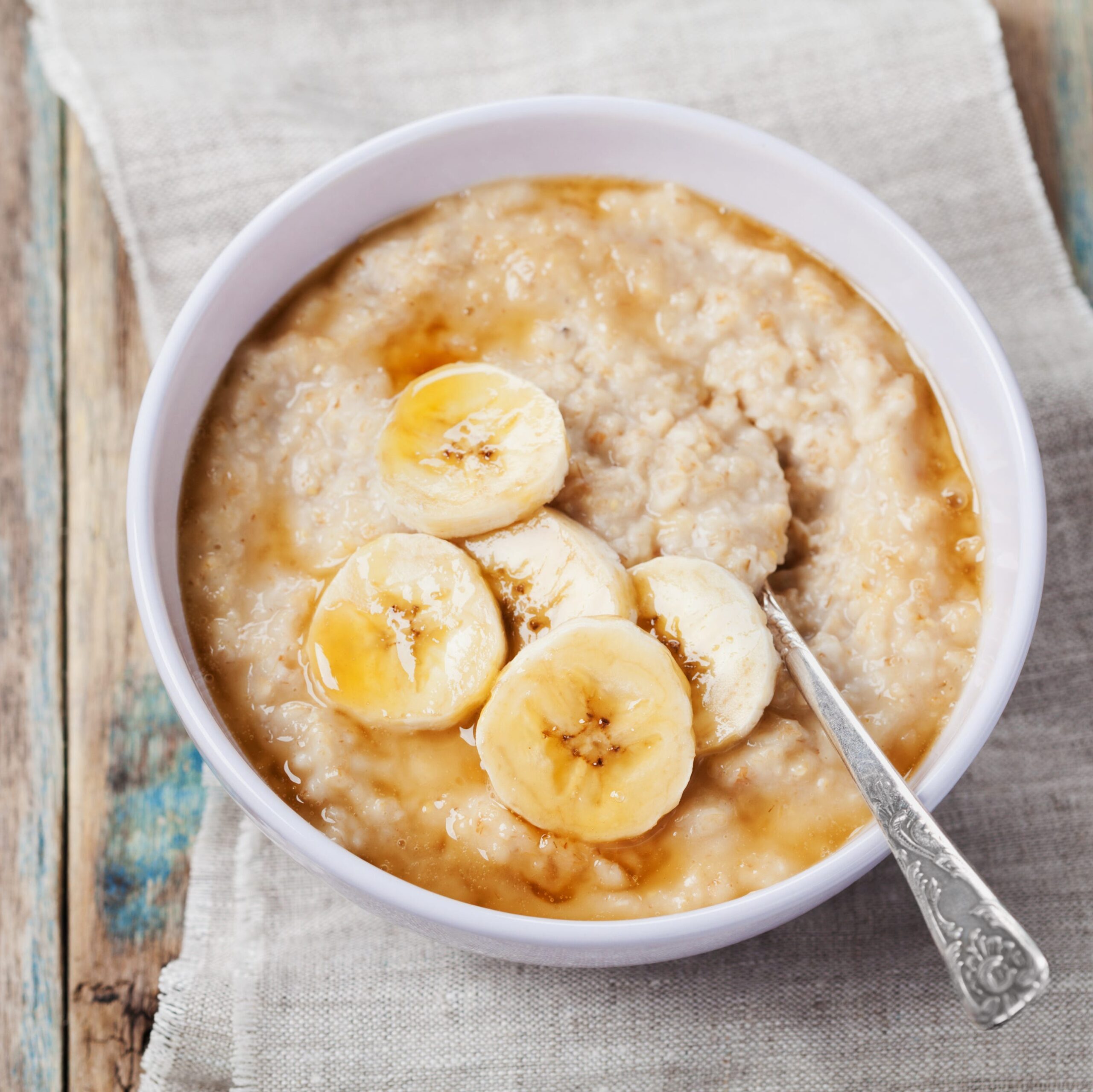 healthy-breakfast-oatmeal-porridge-with-banana-with-royalty-free-image-497816548-1536269148-4080056