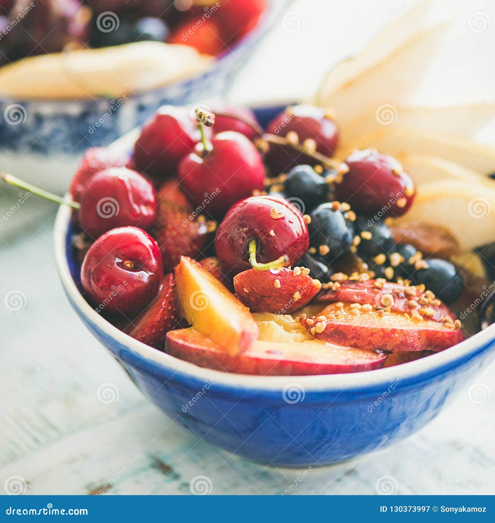 healthy-smoothie-bowl-fruit-berries-square-crop-healthy-smoothie-bowl-fresh-fruit-berries-bee-pollen-honey-130373997-4695451