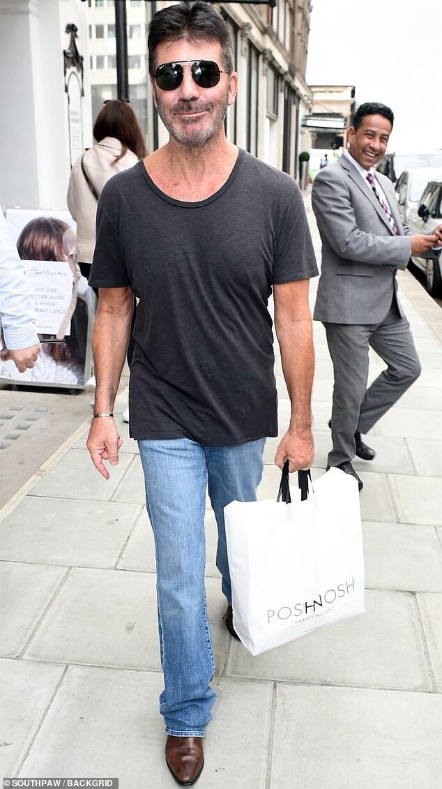 16770604-7310699-weight_loss_the_music_mogul_59_continued_to_showcase_his_recent_-m-77_1564671370636-1383326