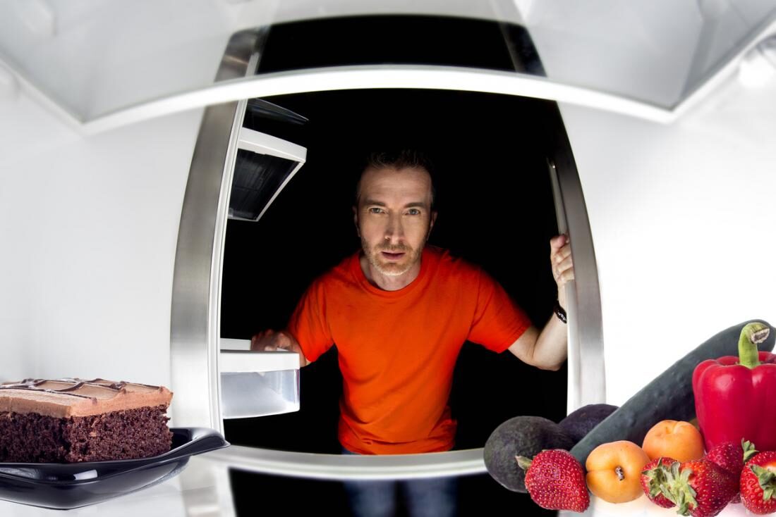 man-looking-in-a-fridge-7127019