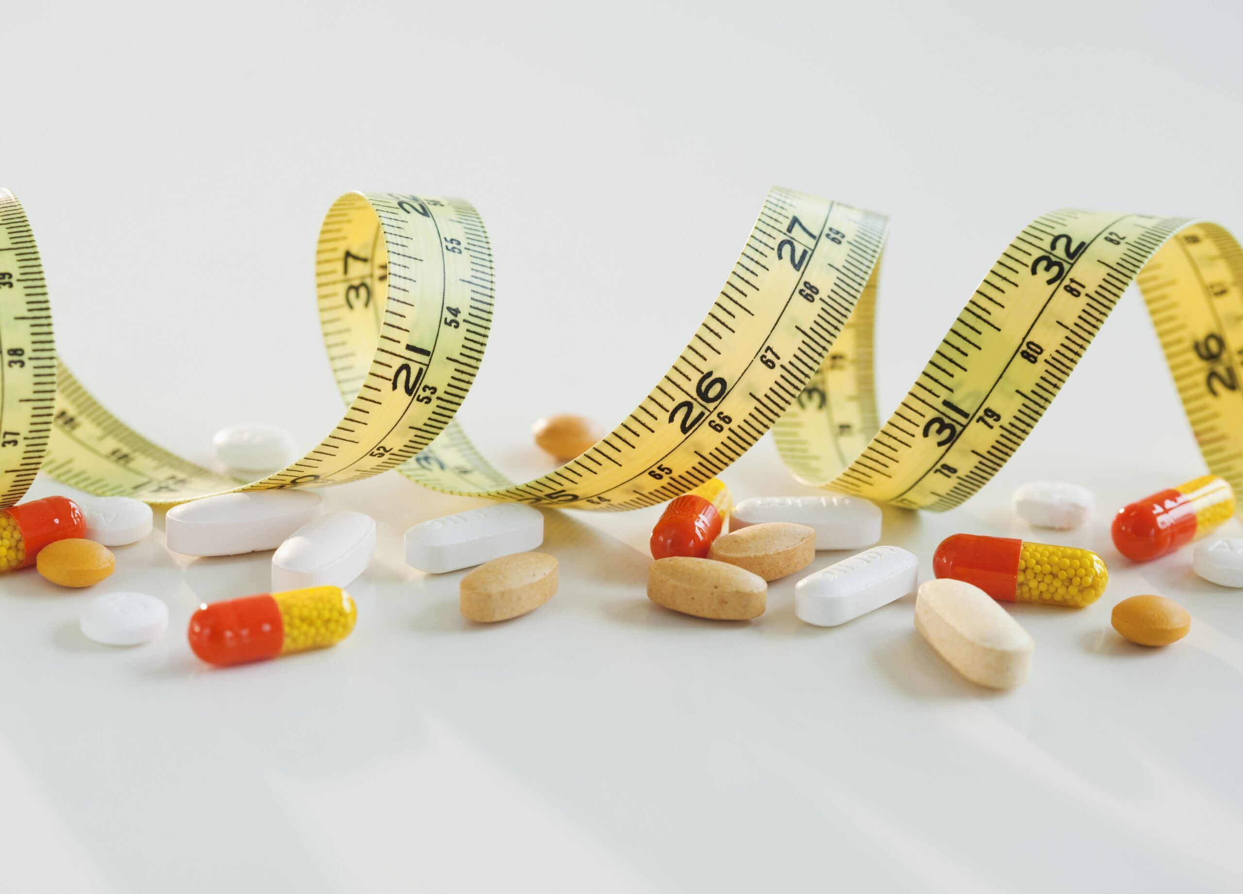 tape-measure-pills-and-capsules-studio-shot-129310944-5c40e454c9e77c00016c379e-7199829